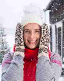 A women with Selbu mittens in Selbu in winter, Norway.