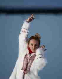 The rebirth of the joik: portrait photo of the Sami artist Elle Márjá Eira outside during winter in Northern Norway.