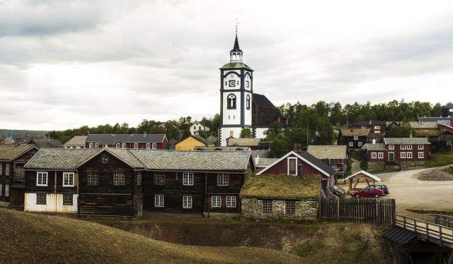 Røros church in Trøndelag surrounded by old wooden buildings