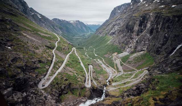 The curvy road up the steep mountain called "Trollstigen" in Rauma, Fjord Norway
