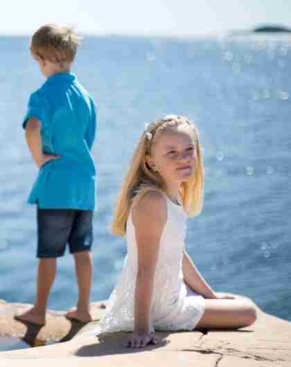 Two children by the sea at Bragdøya in Kristiansand