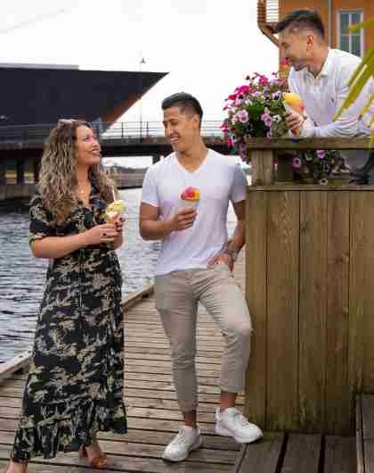 People eating ice cream on the dock in Kristiansand in Southern Norway