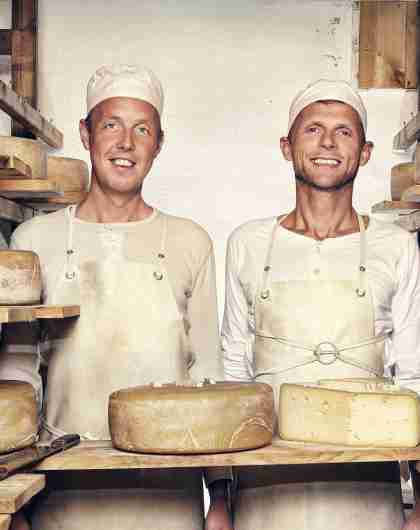 Two men in the cheese factory at Brimi Sæter in Jotunheimen, Eastern Norway