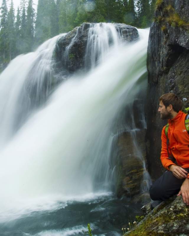 A man next to Rjukandefossen waterfall in Hemsedal, Eastern Norway