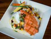 Grilled salmon plated at Haute Quarter Grill