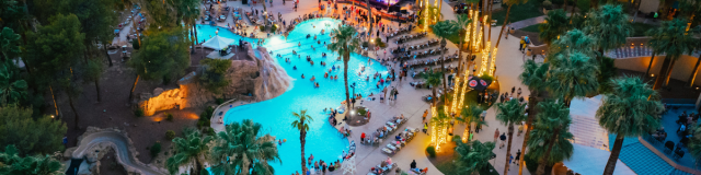 A large group of people having a great time at the pool at CasaBlanca Resort-Casino-Golf-Spa in Mesquite, Nevada.