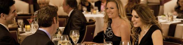 Two couples enjoying themselves at a luxurious dinner at Eureka Gregory's.