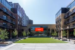 Studio Park's outdoor piazza on a cloudless, sunny day.