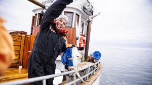 A woman catching a fish