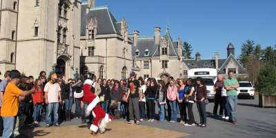 Video Thumbnail - youtube - Dancing Santa - B-boy Santa Sneak Attack in Asheville, NC