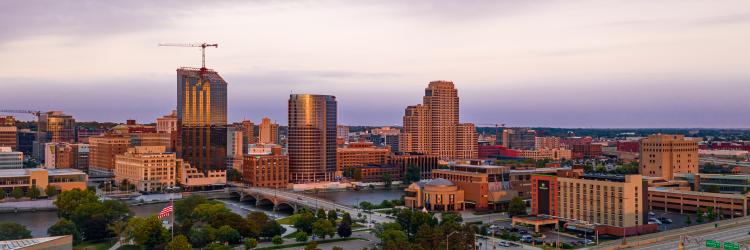 Grand Rapids Downtown Skyline - Highway in Forefront The Grand Rapids downtown skyline sparkles in sunlight in the aerial view.