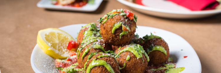 During RWGR, consider Amore's Arancini (risotto fritters topped with spinach aioli) for your appetizer course.