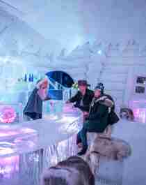 Guests in the ice bar at Snowhotel Kirkenes