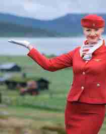 A flight attendant on the Norwegian countryside