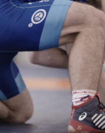 Two wrestlers on the wrestling mat