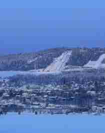 Bird's eye view of Lillehammer and the ski jump hill in winter time