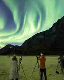 People learning how to photograph the northern lights in Gildeskål, Northern Norway