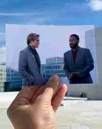 A printed-out film still of the movie Tenet aligned with the real-life location on the roof of the Norwegian Opera House in Oslo, Eastern Norway