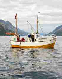 An old fisher boat outside Tromsø