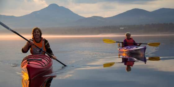 Two women kayaking on Lake Femund
