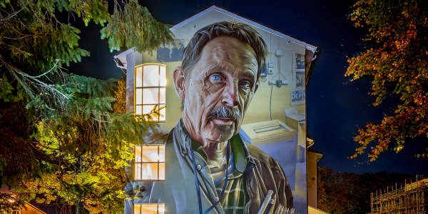 Street art by SMUG on a building in Stavanger, Fjord Norway