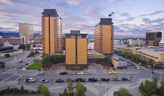 Alaska Hotels Anchorage Lodging Visit Hotel Captain Cook Exterior From Across Fourth Avenue
