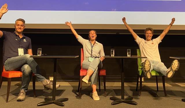 Three people on stage at the Norwegian Swimming Association’s coaching and leadership conference in Oslo, Norway
