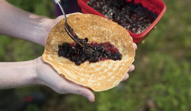 Pancakes with blueberries, served in the forest outside Kongsberg in Eastern Norway