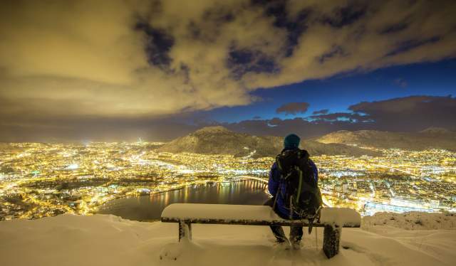 Admiring the view of Bergen from Mount Fløyen in winter, Fjord Norway
