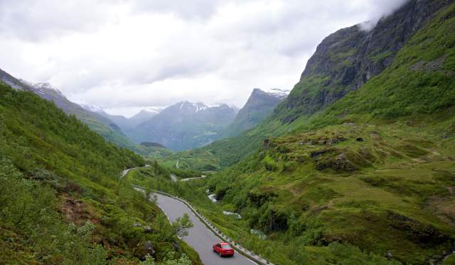 Car driving through the mountain landscape of Dalsnibba, Sunnmøre, Fjord Norway