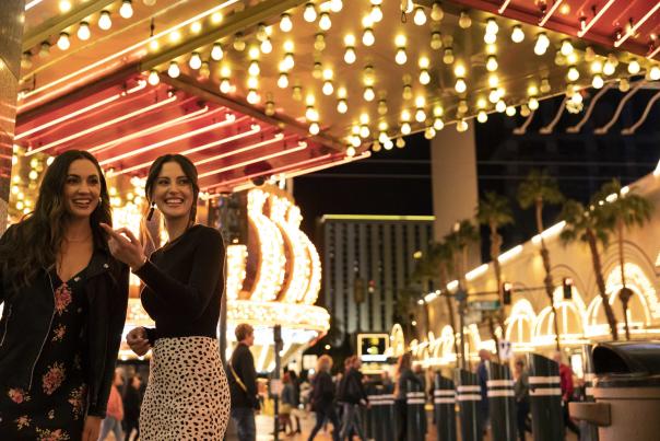 Two women enjoying themselves and having a great time in Downtown Las Vegas.