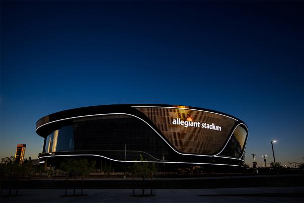 An outside look at Allegiant Stadium during sunset.