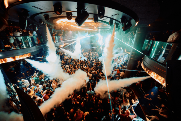 People dancing at LIV nightclub with smoke machines blowing