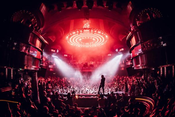 Famous DJ Martin Garrix preforms in front of a roaring audience at OMNIA Nightclub.