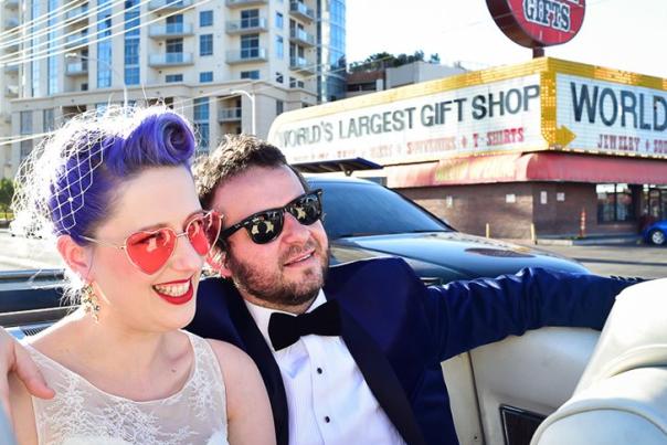 Bride and Groom in a convertible on the Strip