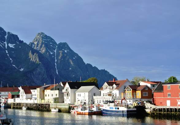 View over the houses near the water and mountains in Henningsvær, Lofoten, Northern Norway
