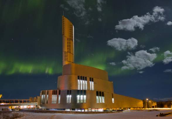 Nordlyskatedralen Cathedral in Alta surrounded by northern lights