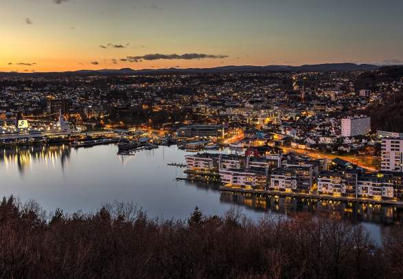 Sandefjord, and the surrounding fjord, seen from a distance at night time