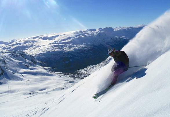 A person alpine skiing in Røldal, Fjord Norway