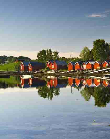 Red fisherman’s cabins by the fjord at Straumen in Inderøy