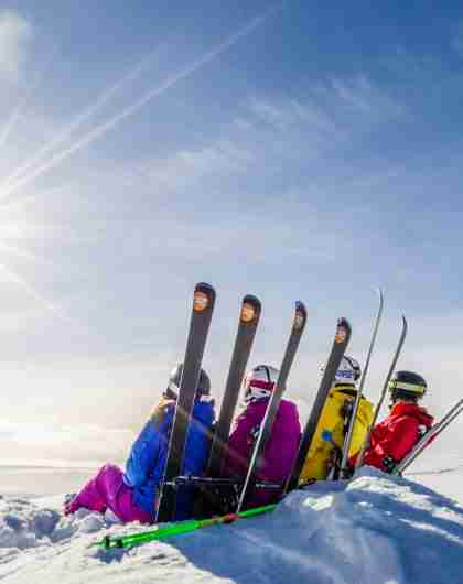 Skiers enjoying a sunny easter day from the mountain top in Trysil, Eastern Norway