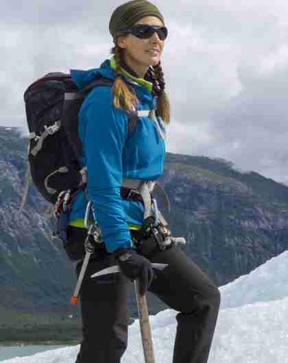 Woman guide standing on the Nigardsbreen glacier
