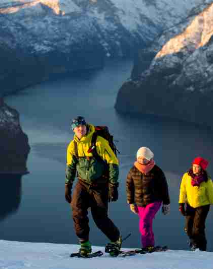 A family of three snowshoeing at Aurlandsfjellet