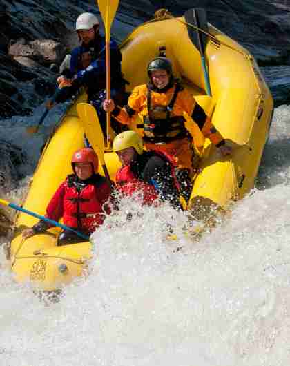 Four people rafting down the Sjoa river