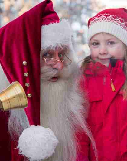 Santa Claus and a girl at one of Norway’s top Christmas destinations, Savalen