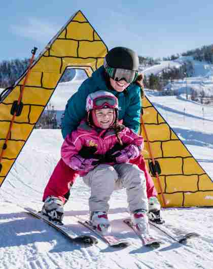 A child learning to alpine ski in Vestlia at Geilo, Eastern Norway