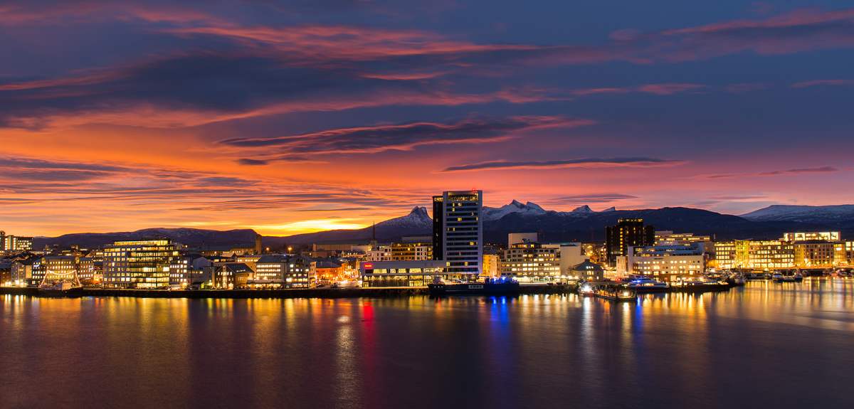 Bodø skyline in the midnight sun, seen from the sea