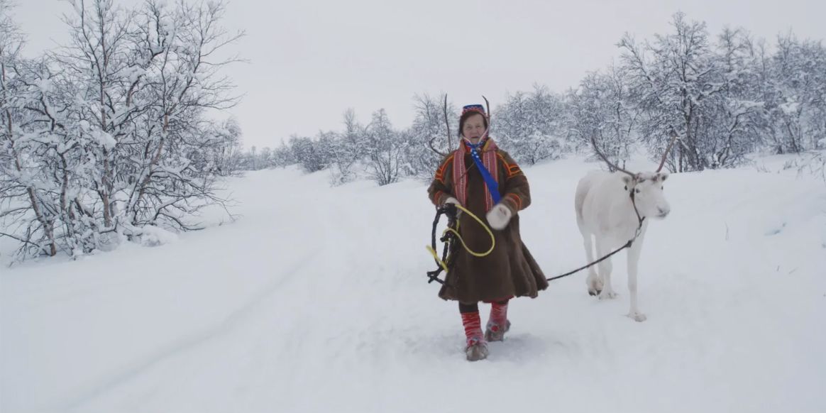 People under the northern lights | Sami reindeer herder Karen Anna