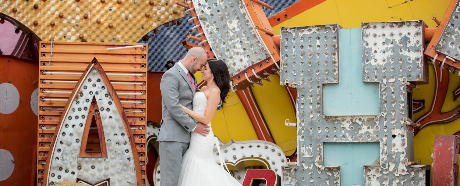 wedding couple at the Neon Museum