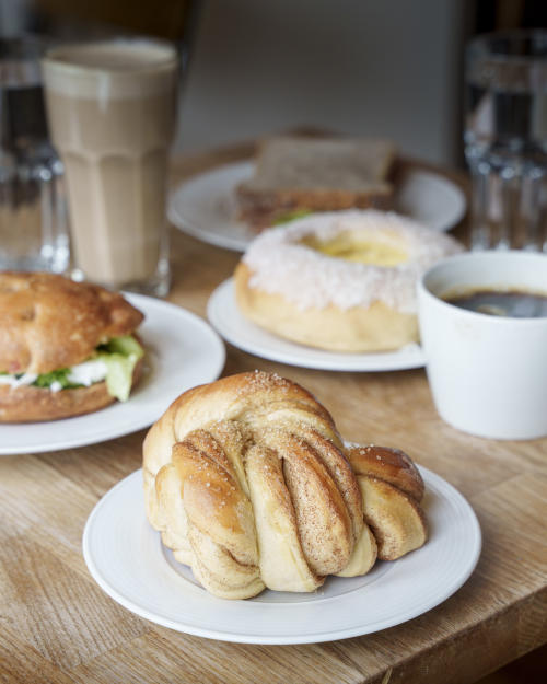 A cinnamon bun on a plate.